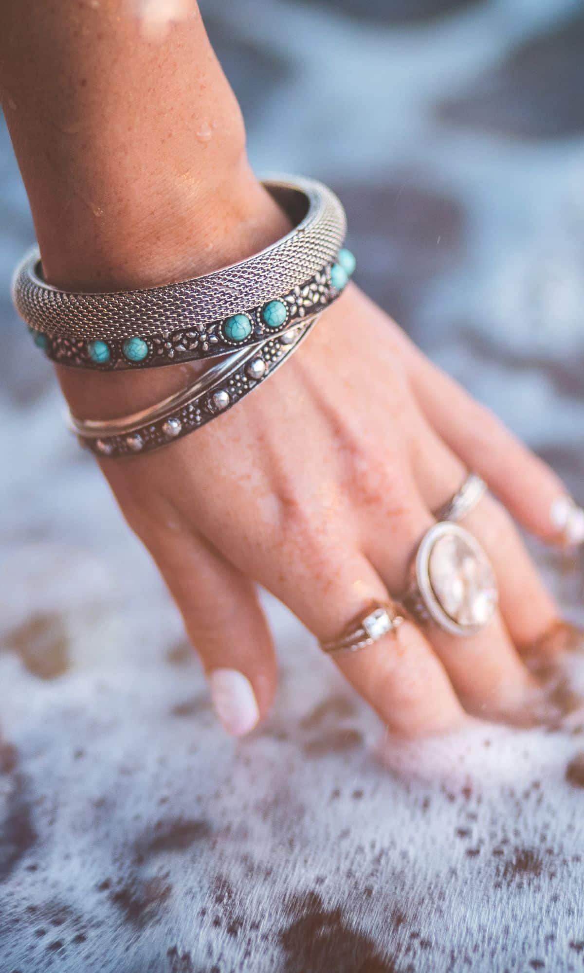 Model wearing snake handcrafted talisman inner power