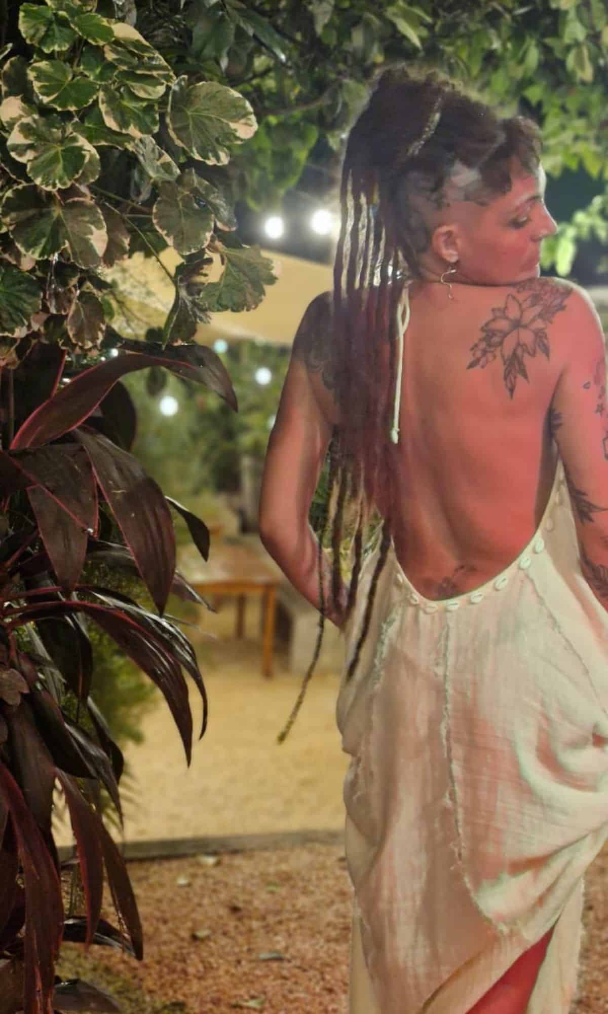 Model wearing snake handcrafted talisman inner power